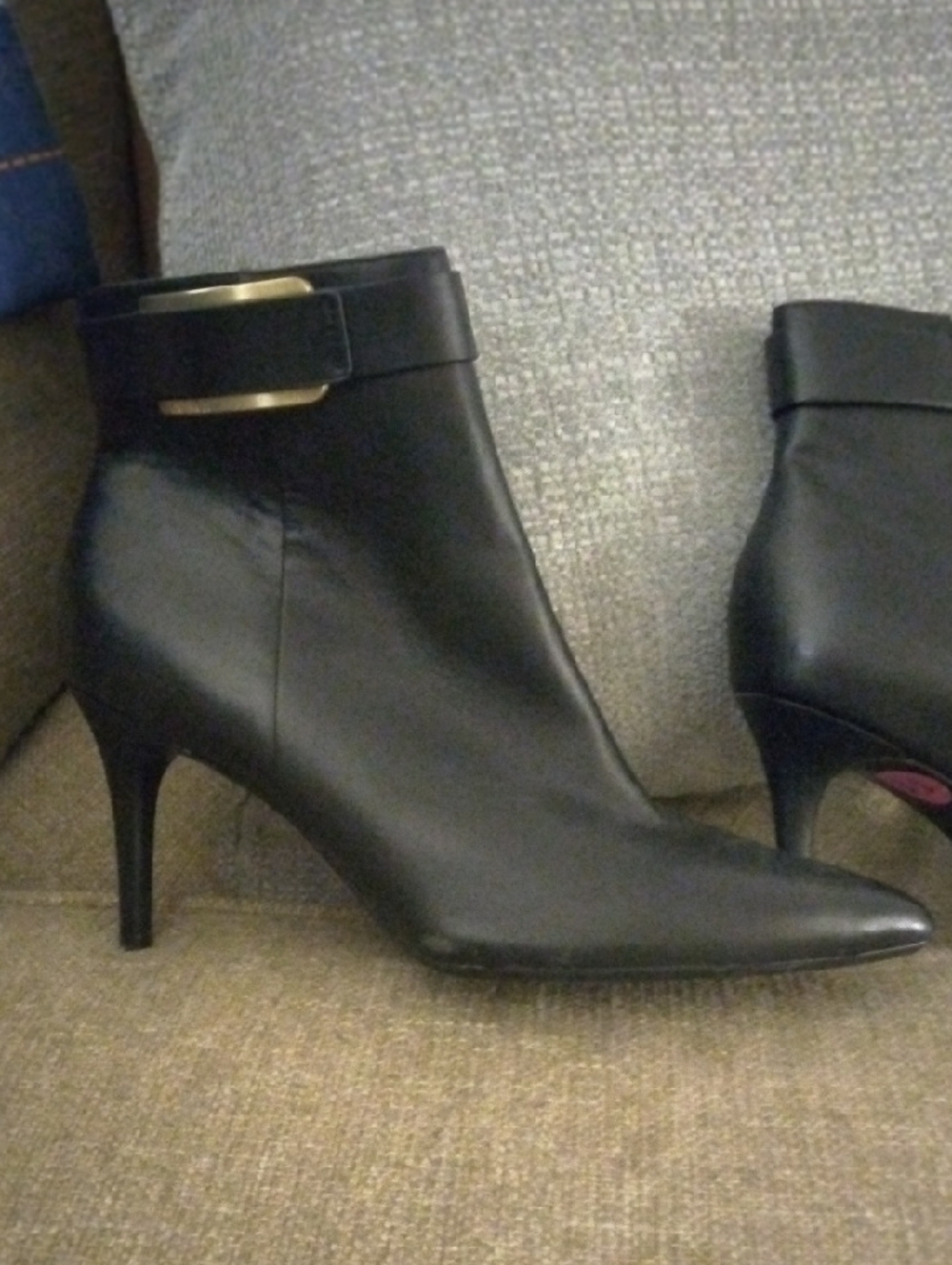 Calvin Klein Black Leather Pointed Toe Ankle Booties with Gold Accent